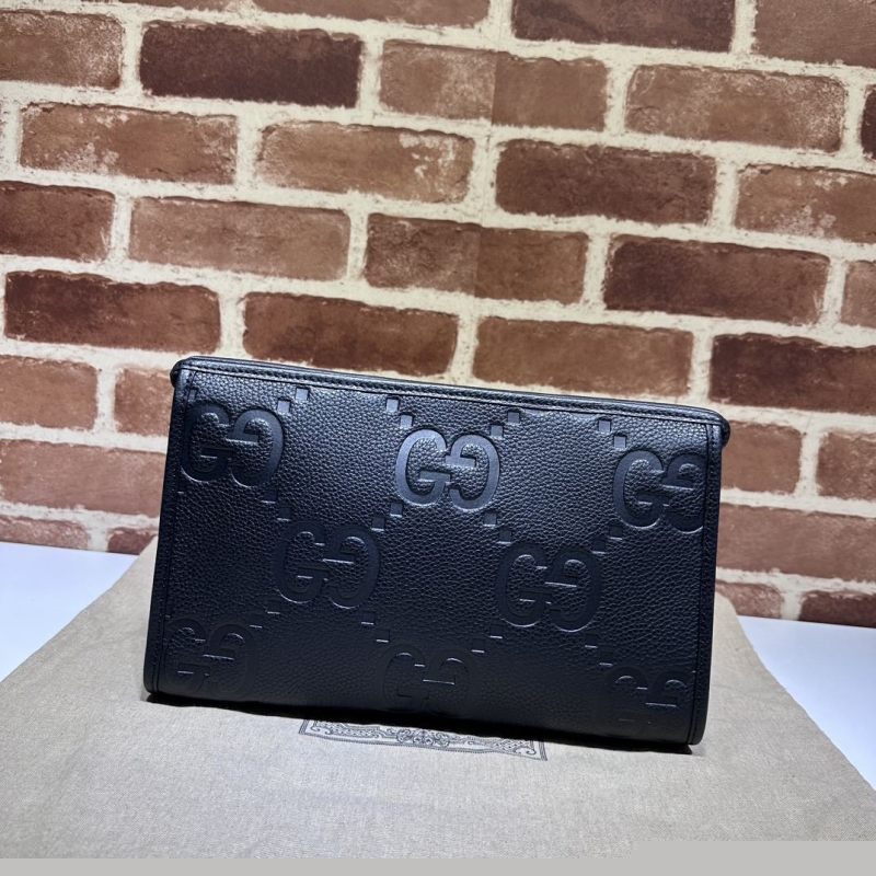 G*u*i clutch bags